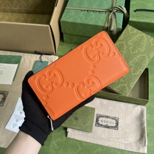 GG Wallet Men's Wallet Jumbo GG zip around wallet in orange leather 739484