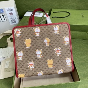 Gucci Handbags GG bag Children's tote bag with doraemon print 612992 605614